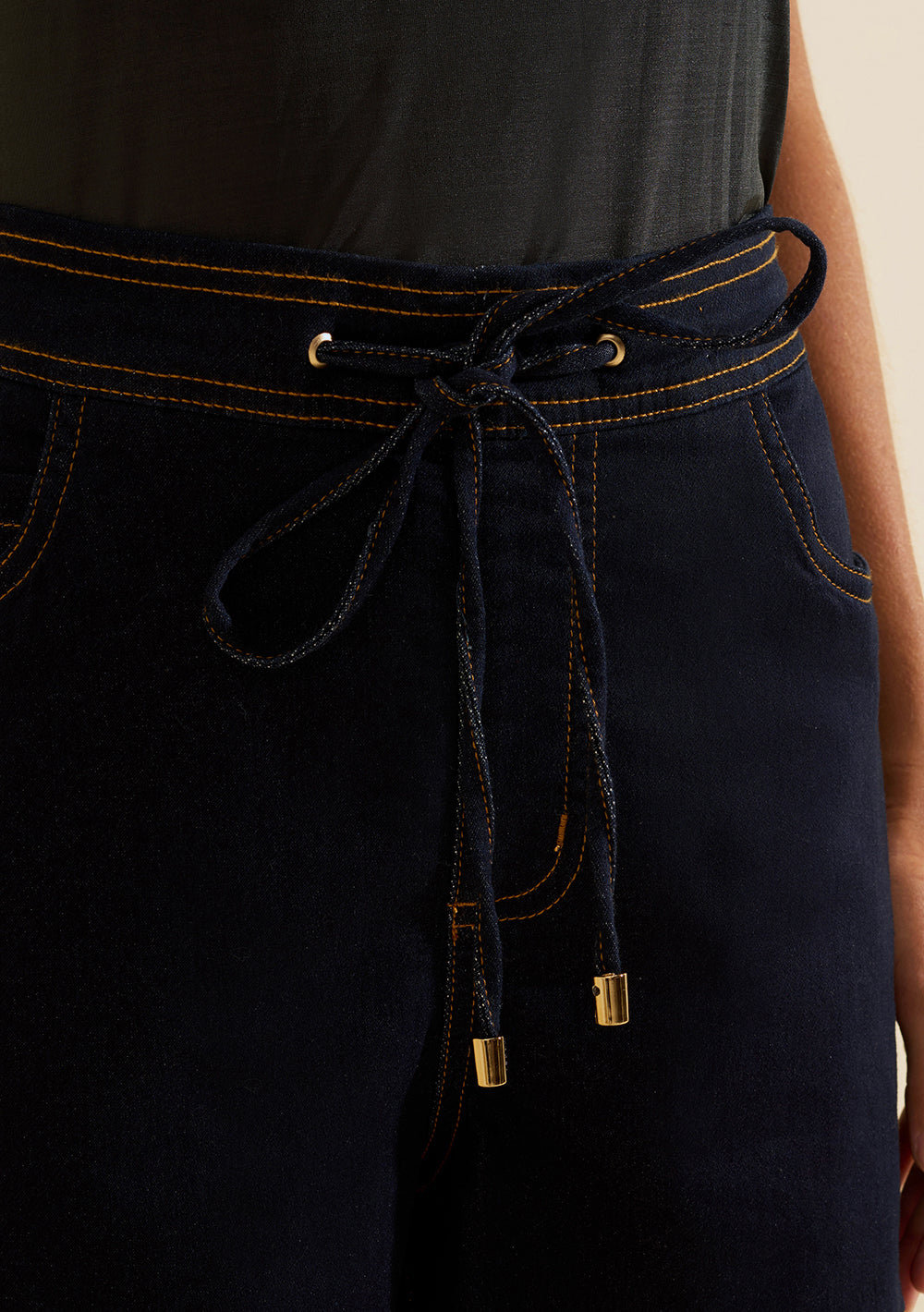 Short Amplio Tiro Alto
